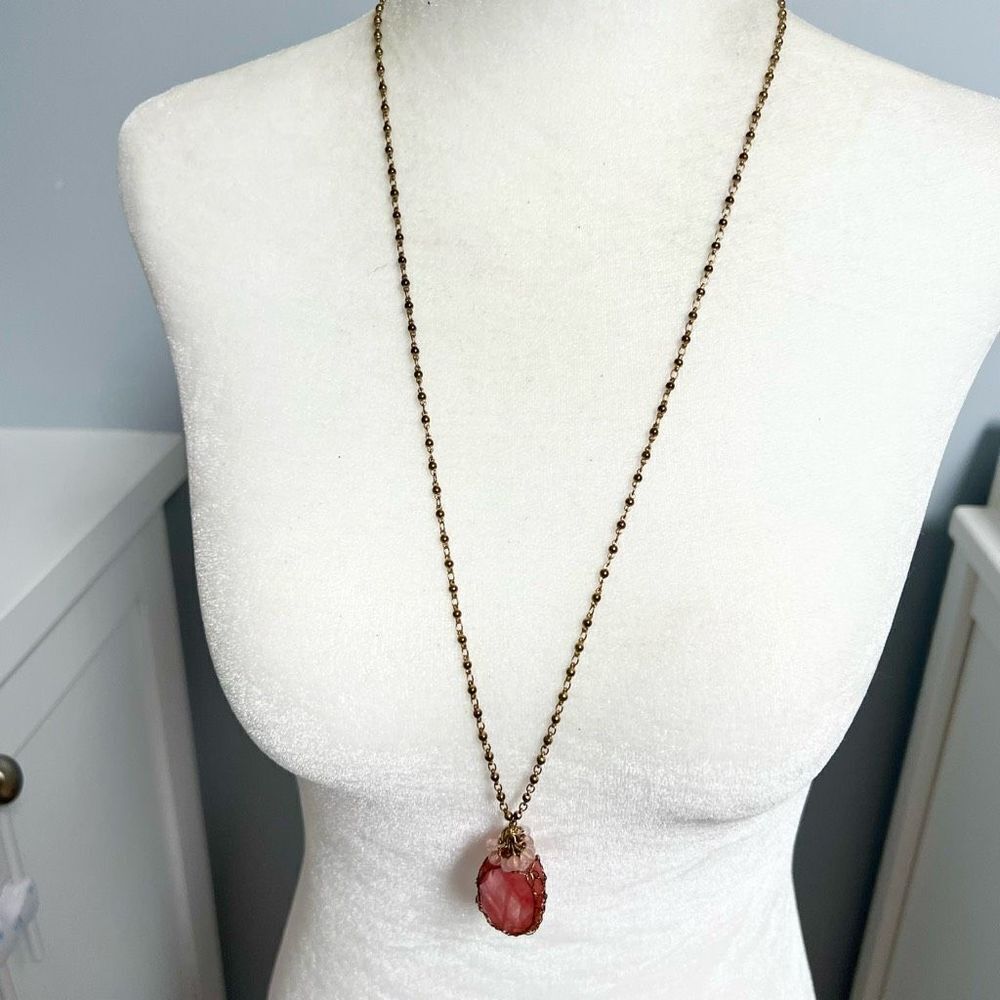 Long pink faceted stone crystal pendant boho necklace on a gold tone chain